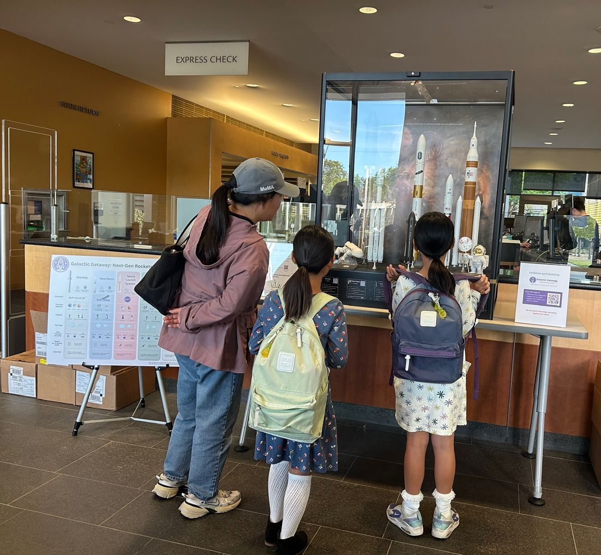 Young visitors at a library display